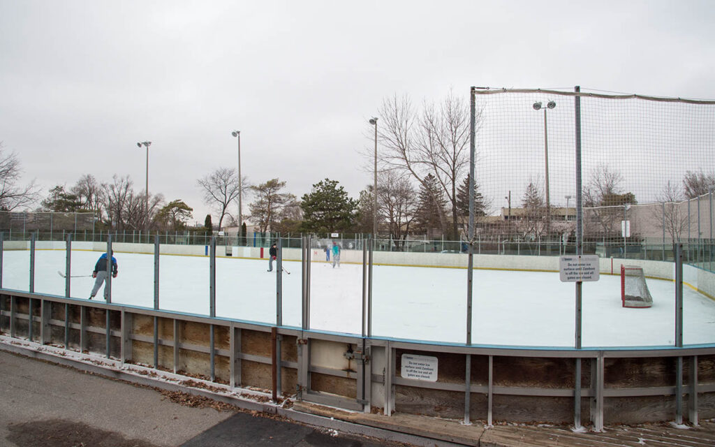 Playing shinny on the outdoor rink at Broadlands Community Recreation Centre.